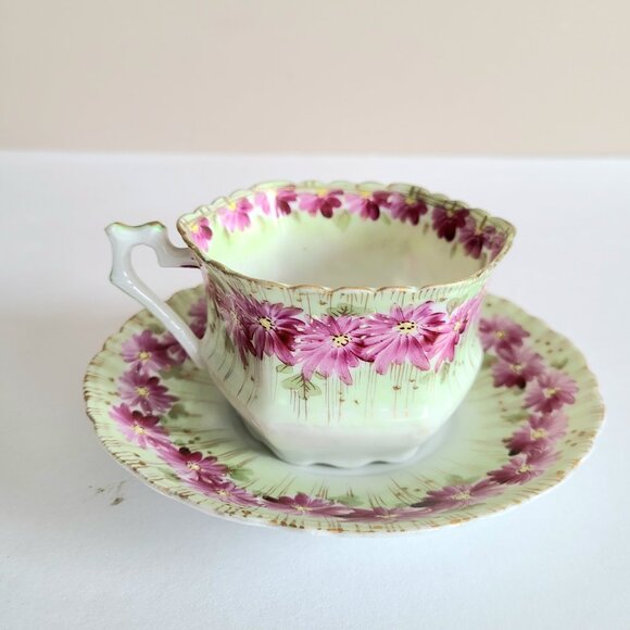 Antique porcelain tea cup with saucer with pink floral design and gold trim. - Picture 4 of 13